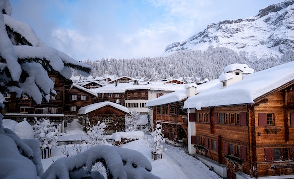 Snow-covered chalet in a winter mountain setting