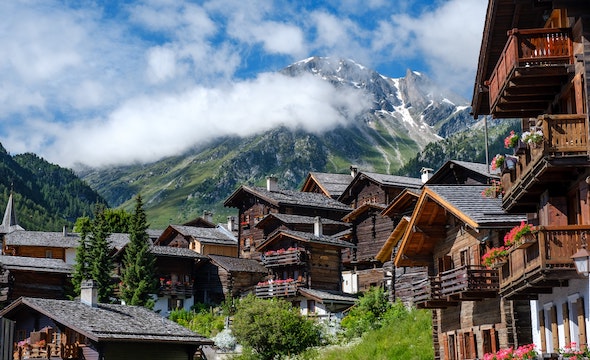 Snow-covered chalet in a winter mountain setting